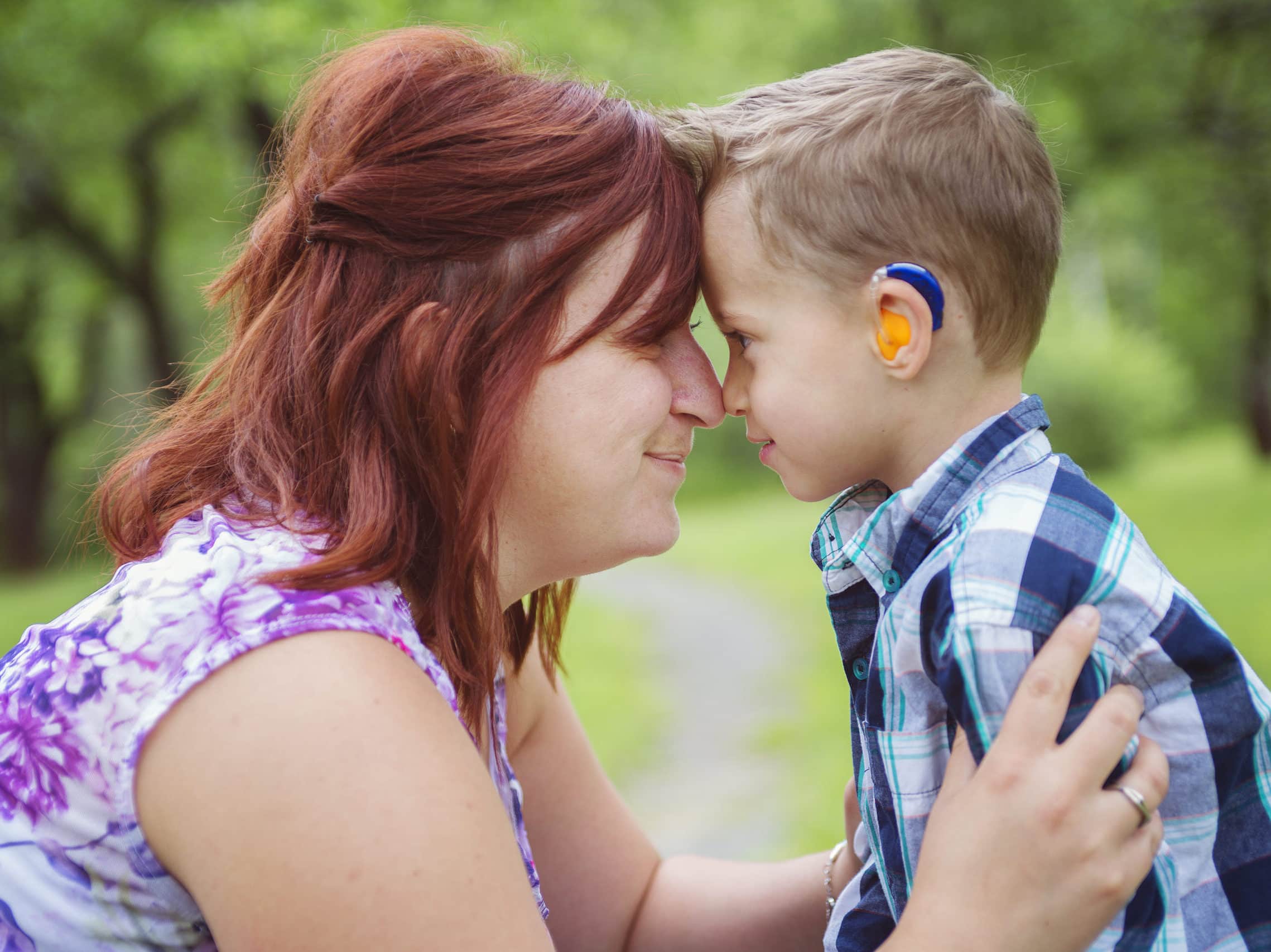 A Mother and son in park having fun